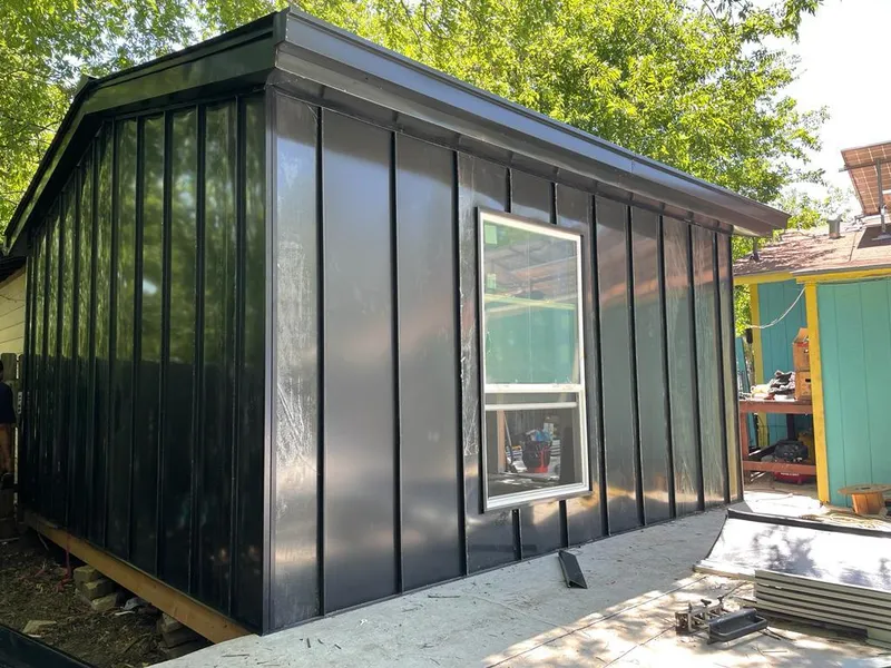 Black standing seam metal wall panels for Roof Inspection in Kettering